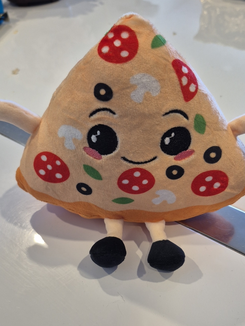 Peach Pizza Slice Plush Toy with Black Accents